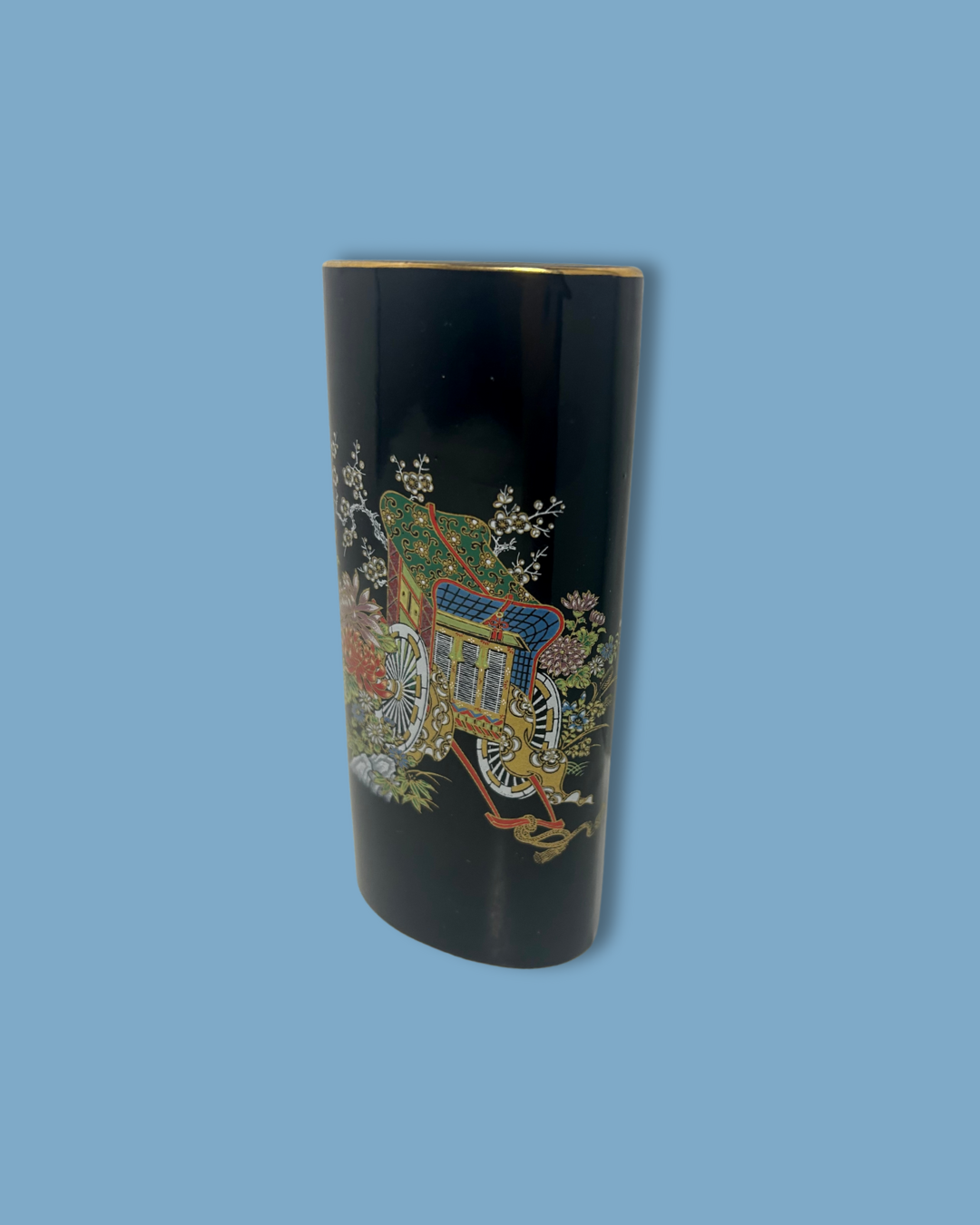 Decorative vase with intricate design on a blue background