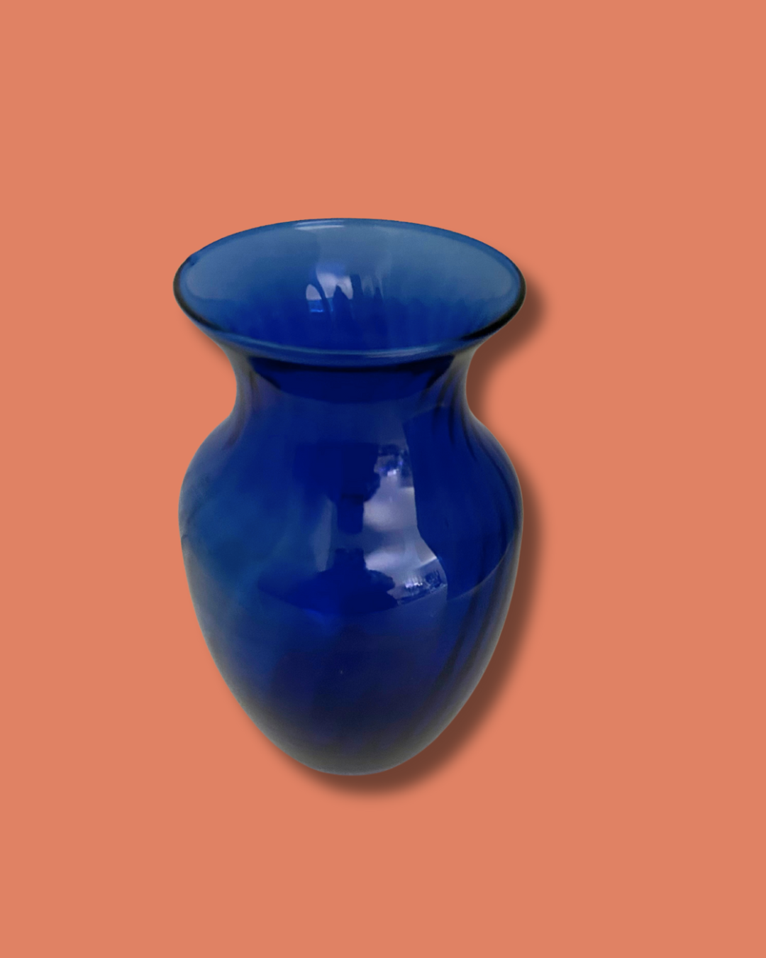 Blue vase on a peach background