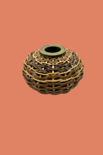 Woven basket on a solid background