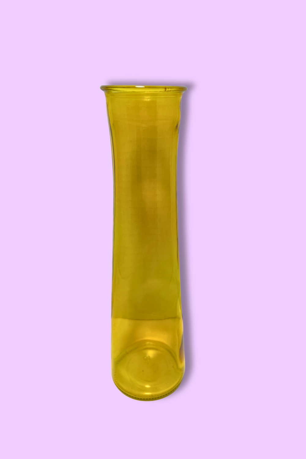 Yellow glass vase on a light purple background
