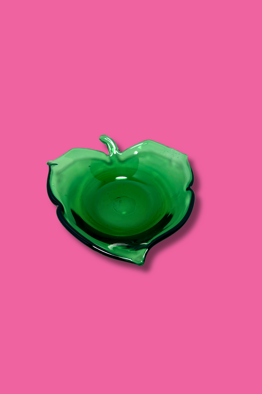 Green Leaf shaped dish on a pink background